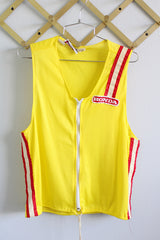 Women's or men's vintage 1970's Hondaline Sportswear sleeveless zip up nylon mesh vest in yellow with red and white trim. Honda patch on left chest. 