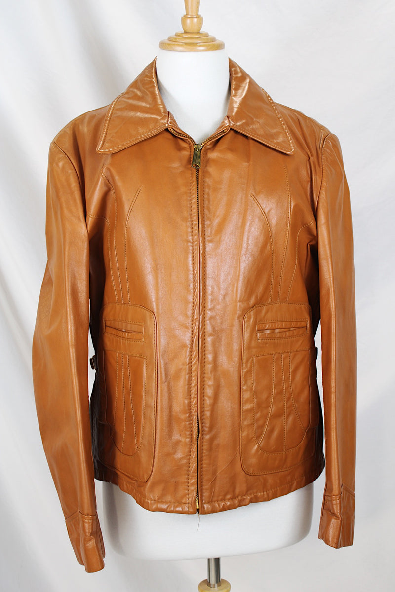 Men's or women's vintage 1970's The Leather Shop, Sears The Men's Store label long sleeve short length camel brown colored leather zip up jacket.
