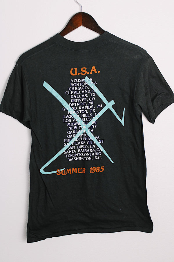 Women's or men's vintage 1985 Star Prints, Made in USA label short sleeve black Howard Jones Band tour tee with graphic on front and back in a cotton material.