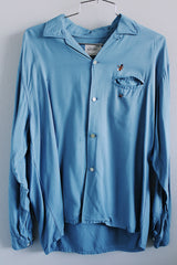 Men's vintage 1960's Penney's Towncraft label long sleeve blue button up shirt with one left chest pocket. Small embroidered golf clubs on chest.