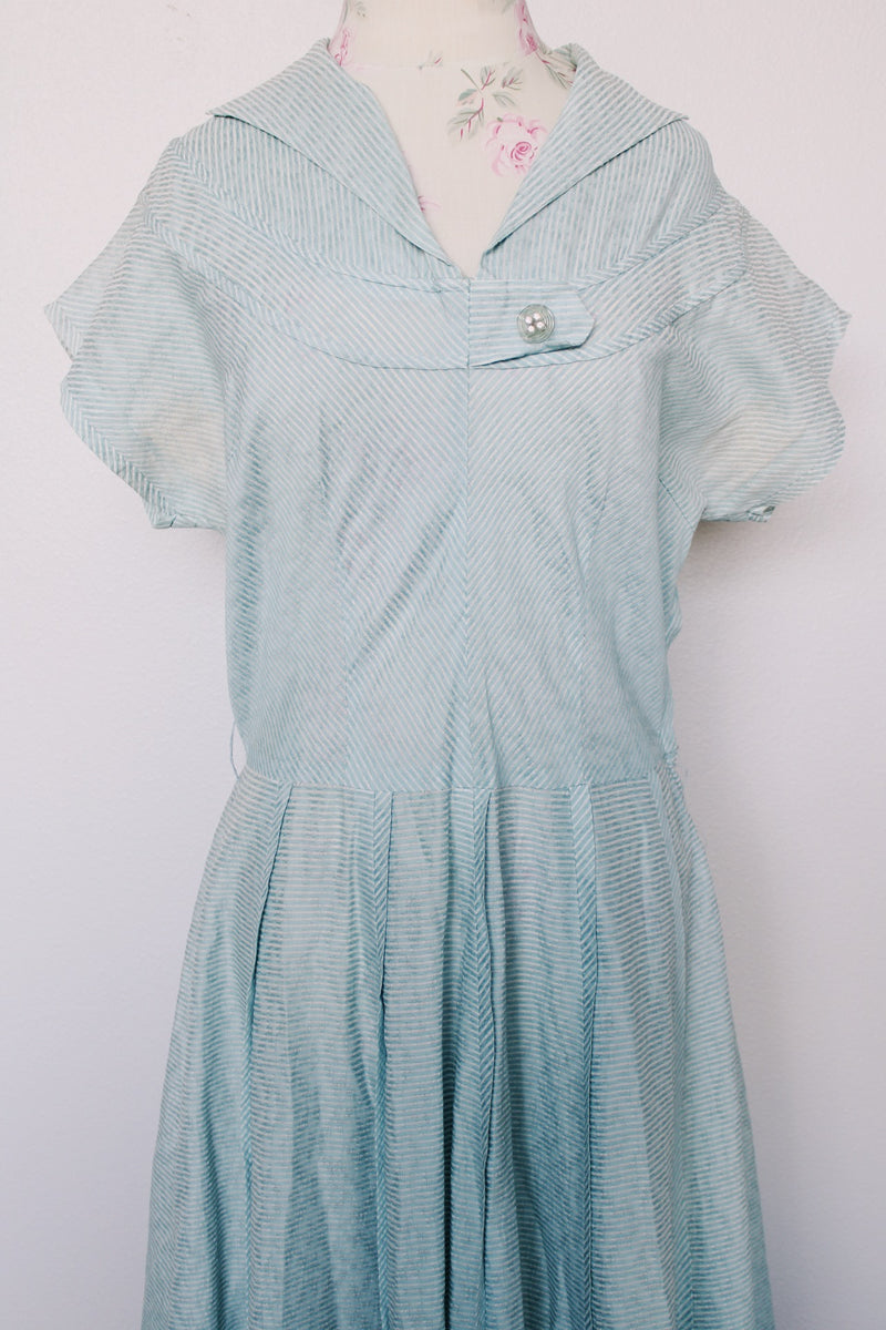 Women's vintage 1960's Toni Todd Original label short sleeve midi length light blue sheer a line dress.
