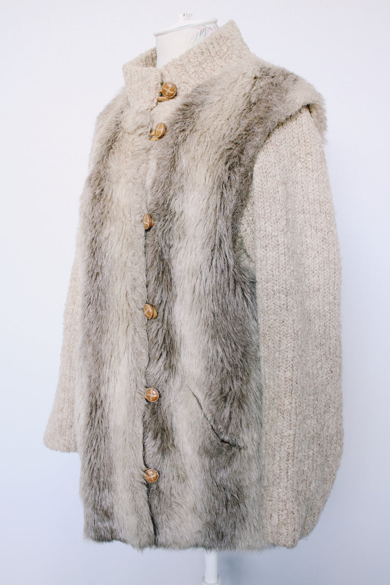 Women's vintage 1980's Lifestyle 80's by Andrea Ungar label long sleeve jacket with faux fur body in front and back and acrylic arms. Buttons up the front with side pockets.