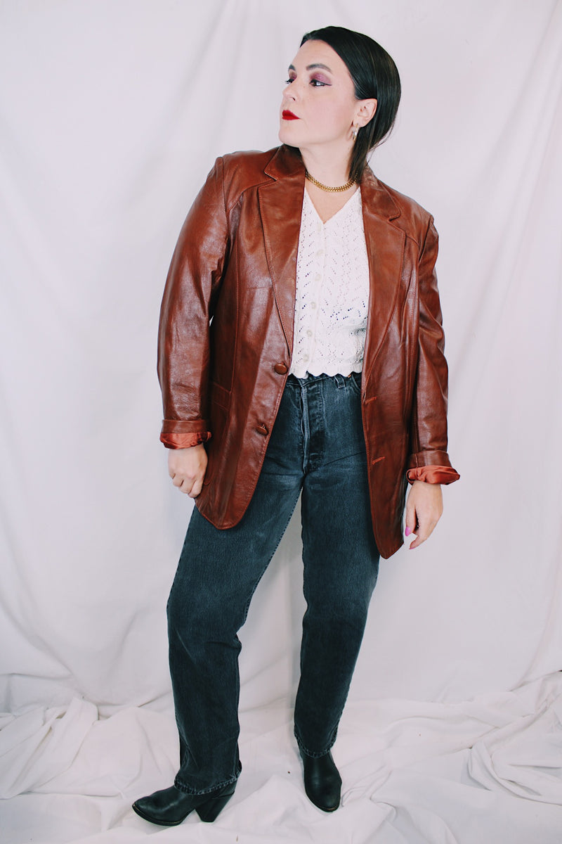 Men's or women's vintage 1980's Adler, Leather MFG. CO., Made in California label brown leather blazer jacket with front pockets and two button closure.