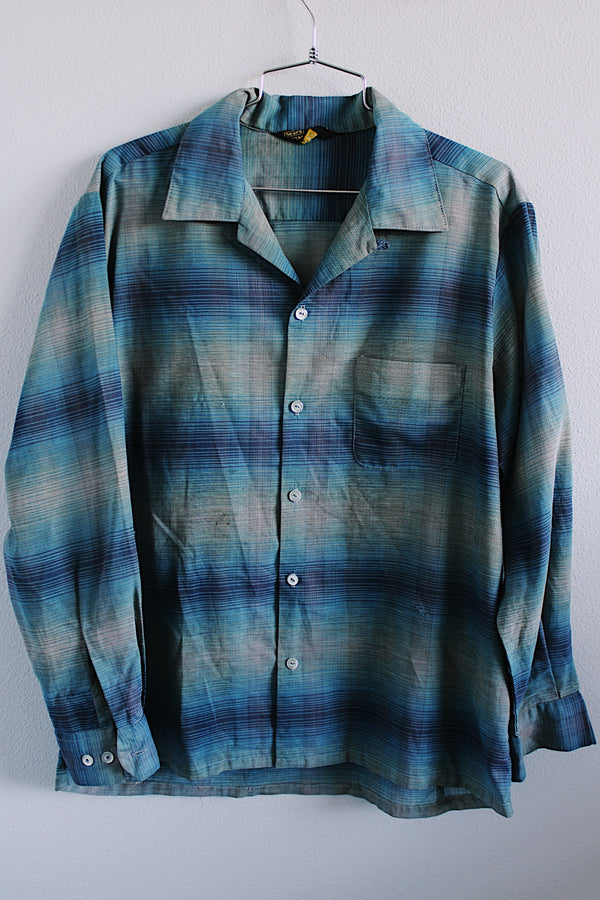 Men's or women's vintage 1960's Sears label long sleeve button plaid shirt in blue and grey colors. One left chest pocket. 