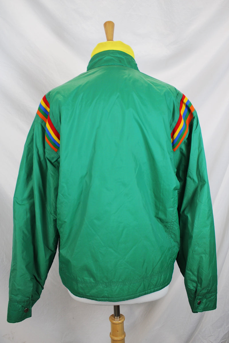 Women's or men's vintage 1980's Pacific Trail Sportswear label long sleeve green zip up nylon puffer jacket with yellow and rainbow colored trim. 