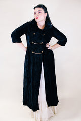 Women's vintage 1960's Raymodes, NY label long length long sleeve black velvet duster coat. Bronze buttons with bronze chains.