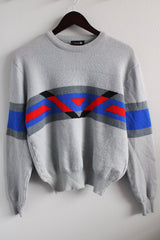 Men's or women's vintage 1980's Demetre, Made in USA label long sleeve pullover crew neck sweater in light grey with colored pattern across chest in wool material.