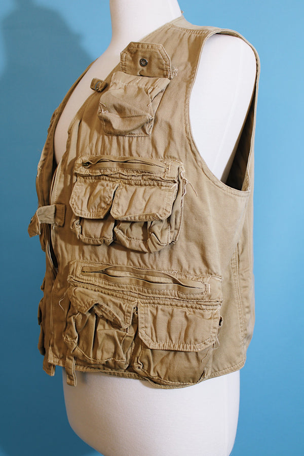 Men's or women's vintaGe 1980's Wild Life Brand, Fishing Vest label sleeveless light tan colored zip up vest in a cotton material. Has multiple pockets in the front. 