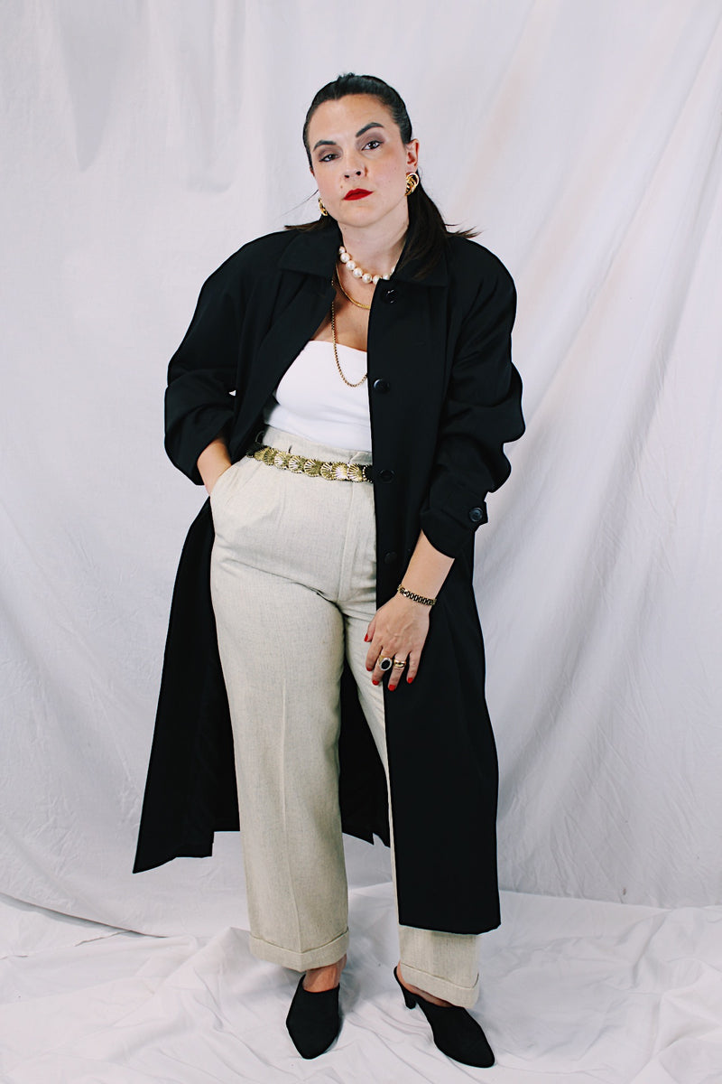 Women's vintage 1990's Nordstrom - Point of View label long sleeve long length black trench coat in a wool material. Fully lined, side pockets, back slit, and shoulder pads. 