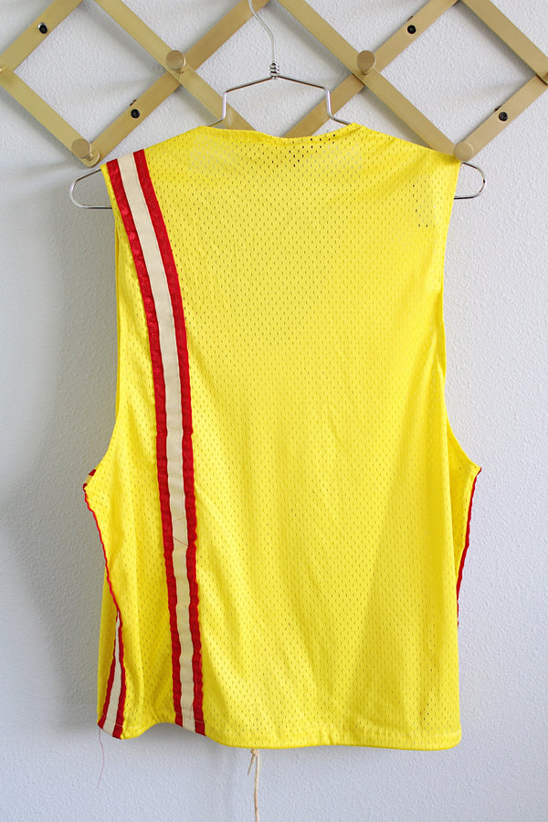 Women's or men's vintage 1970's Hondaline Sportswear sleeveless zip up nylon mesh vest in yellow with red and white trim. Honda patch on left chest. 