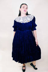 Women's vintage 1970's crushed blue velvet dress with cream embroidery peter pan collar. Short sleeves and ankle length. 