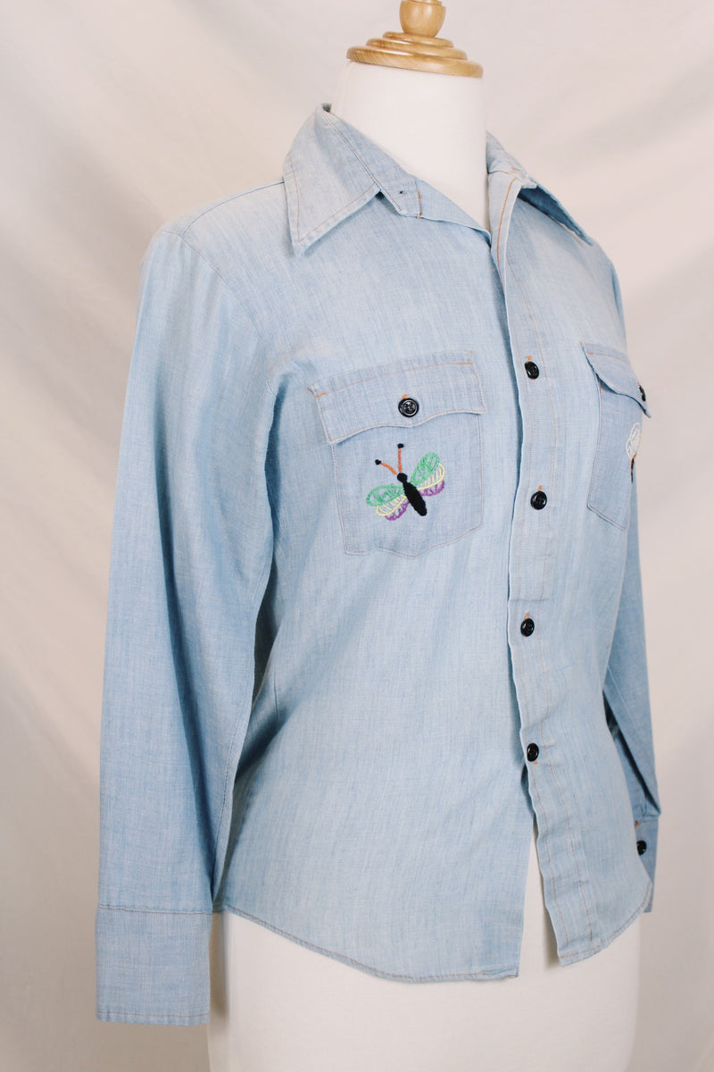 Men's or women's vintage 1970's JCPenney label long sleeve light blue chambray denim shirt with all over colored embroidery. 