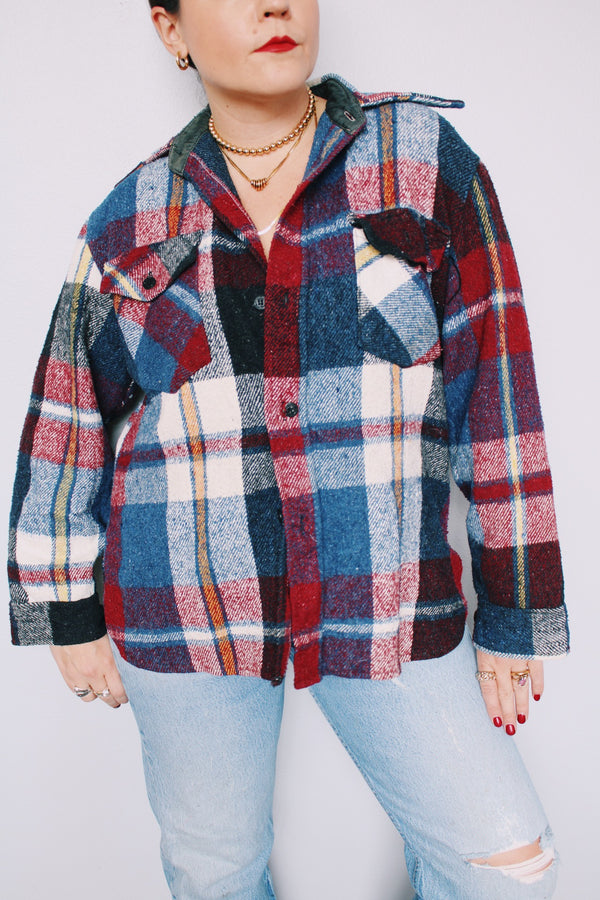 Men's or women's vintage 1970's Creations by Jason Clarpe label size medium plaid print button up shacket in blue, white, black, and maroon plaid print