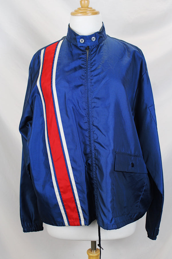 Men's or women's vintage 1980's Swingster Wearables, Made in USA label long sleeve zip up windbreaker in navy color and nylon material. 
