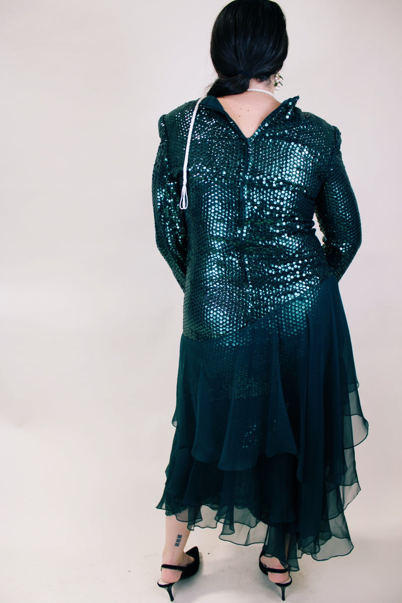Women's vintage 1980's long sleeve ankle length dress with all over sequins and a tiered ruffles skirt. Forest green color. 