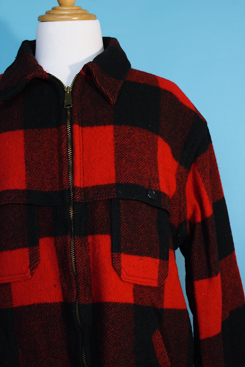 Women's or men's vintage 1960's Woolrich label long sleeve red and black buffalo plaid zip up shacket.