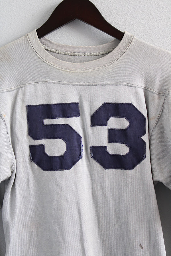 Women's or men's vintage 1960's Southern Manufacturing Co., Quality Athletic Wear, Made in USA label long sleeve sport jersey in light grey with navy letters.