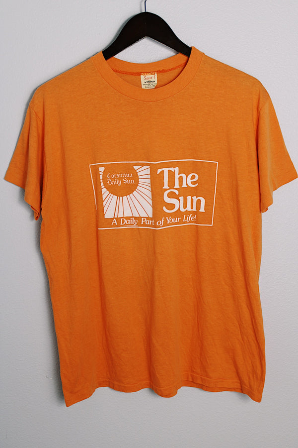 Women's or men's vintage 1970's Sport-T by Stedman label short sleeve orange tee with white graphic on the front and back in a cotton and polyester material.
