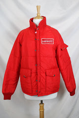Women's or men's vintage 1980's Horizon Sportswear Inc., Made in USA label long sleeve red nylon puffer jacket with patch on left chest.