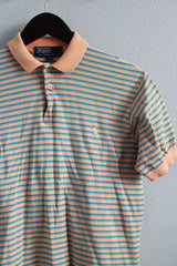 Men's or women's vintage 1990's Polo By Ralph Lauren label short sleeve peach and blue colored stripe polo tee with collar and half button closure.