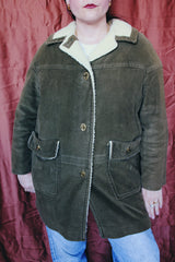 Men's or women's vintage 1950's Chumley Sport Shop, Charles F. Berg label long sleeve army green velvet PVC coat with cream shearling liner