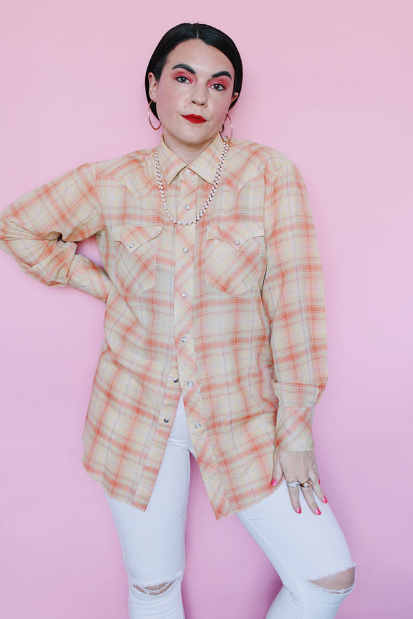 Men's or women's vintage 1970's long sleeve plaid print Western style shirt with pearl white snapper buttons and silver hardware. Light green, coral, yellow, and gold metallic colors. 