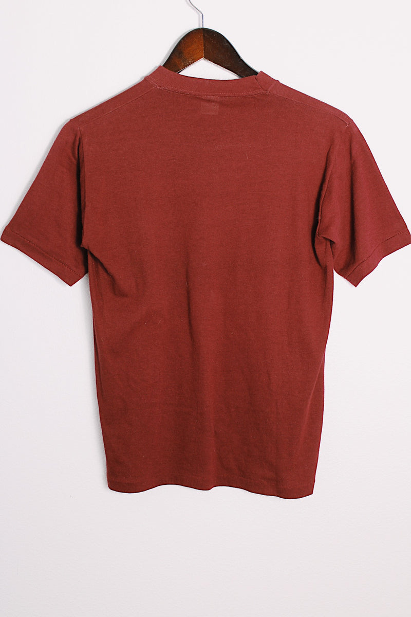 Men's or women's vintage 1970's Sportswear, Made in USA label maroon colored tee with white graphic on the front in a polyester and cotton material. 