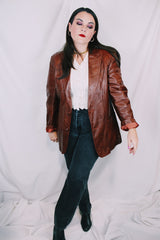 Men's or women's vintage 1980's Adler, Leather MFG. CO., Made in California label brown leather blazer jacket with front pockets and two button closure.