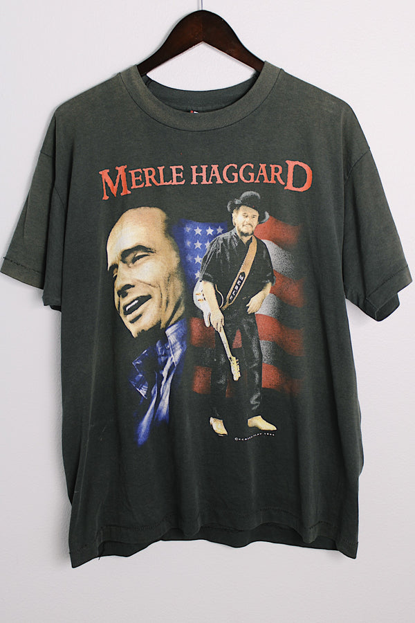 Men's or women's vintage 1994 Best, Fruit of the Loom, Made in the USA label black Merle Haggard tour tee with large colored graphic on front and back in a cotton and polyester material. 