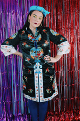 Women's vintage 1970's Bai Hua, Made in China label 3/4 arm length mid length lightweight robe jacket in black, white, blue, and an all over floral embroidered print.