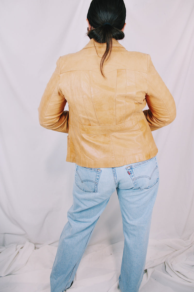 Women's vintage 1970's Creaciones Exclusivas, Cevy's, Made in Mexico label long sleeve tan brown leather jacket. Western style. Button closure and fully lined