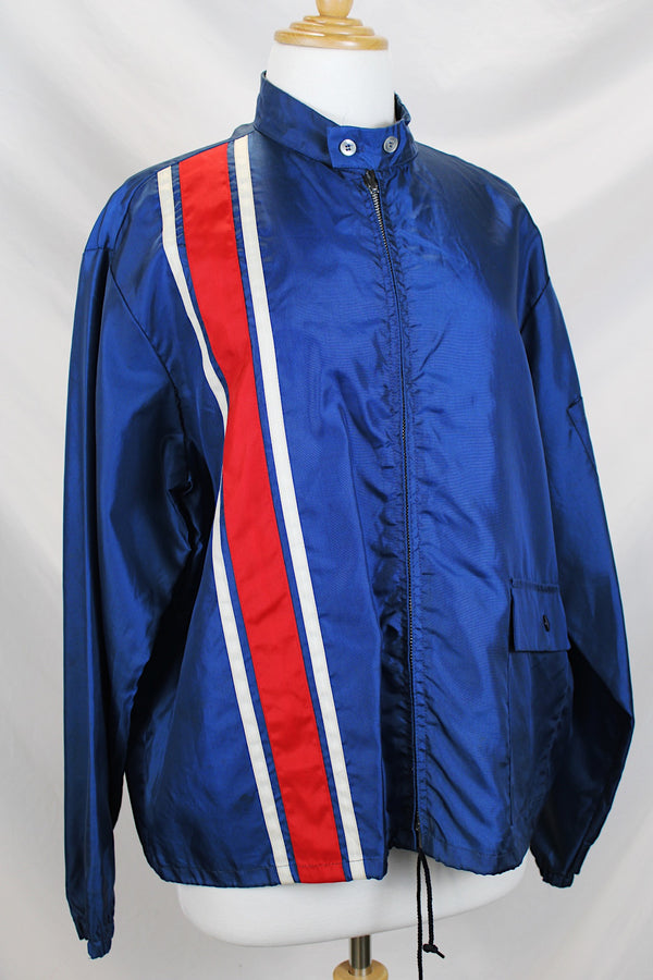 Men's or women's vintage 1980's Swingster Wearables, Made in USA label long sleeve zip up windbreaker in navy color and nylon material. 