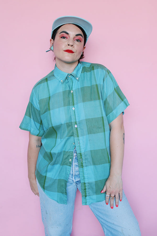 Men's or women's vintage 1960's John Wells, Traditional Tapered, Made in USA label short sleeve button up shirt in blue and green large plaid print. 