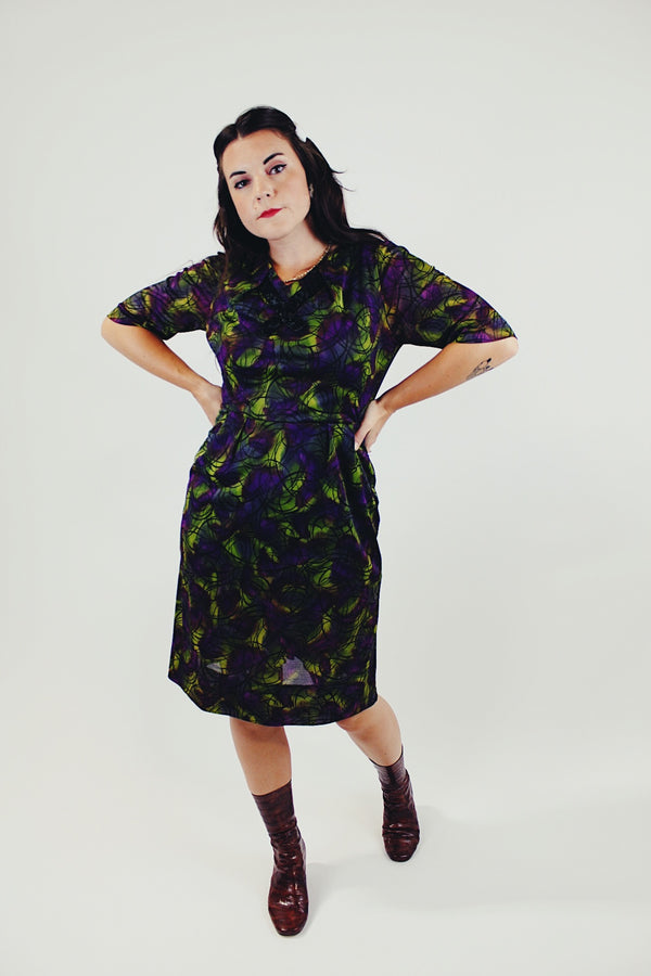 vintage green and purple printed midi dress with slight v neck and 3/4 arm length back