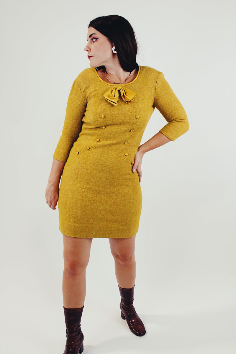 vintage mustard yellow wool mini dress with satin bow and buttons 3/4 length sleeve front