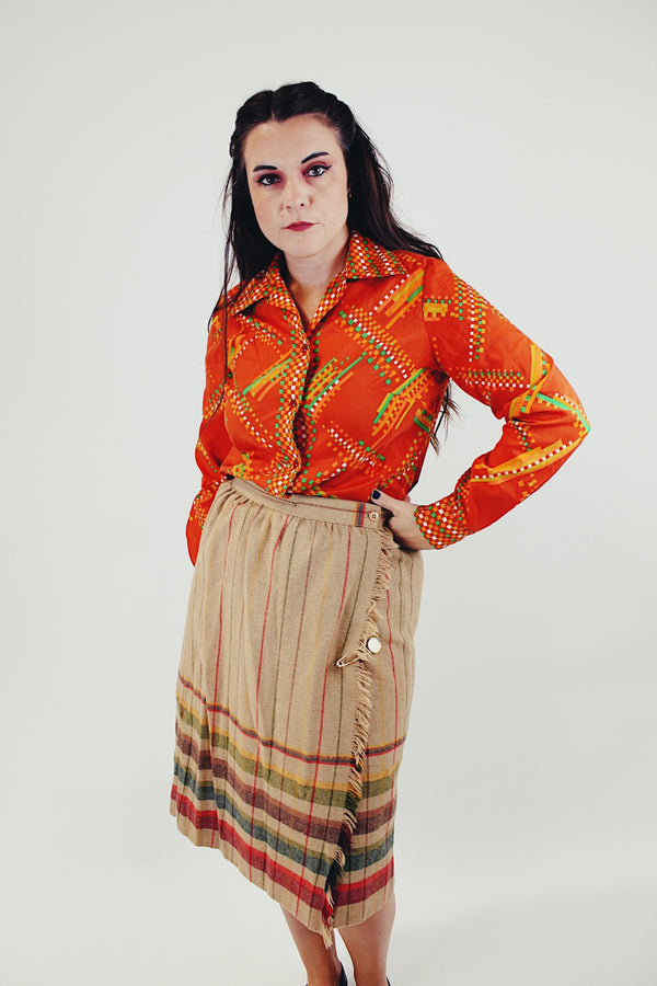 vintage bright orange long sleeve button up blouse with collar green, white, and light orange print front