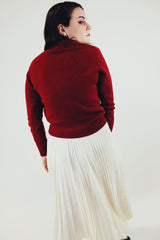 vintage maroon long sleeve pullover sweater with v-neck and stripes back