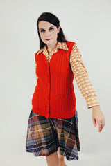 Vintage Orange button up vest with two front pockets and knitted braiding front