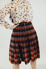 vintage high waist plaid skirt with plaid print in brown orange and yellow with pleats back 