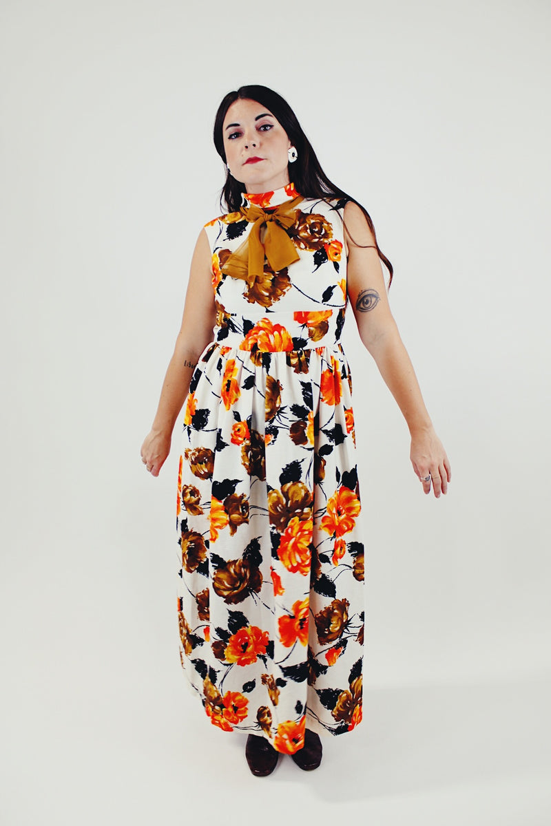 vintage sleeveless floral printed maxi dress with mock neck and neck tie orange white brown front