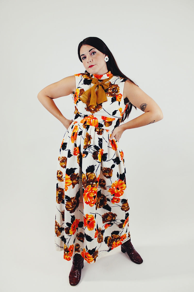 vintage sleeveless floral printed maxi dress with mock neck and neck tie orange white brown front