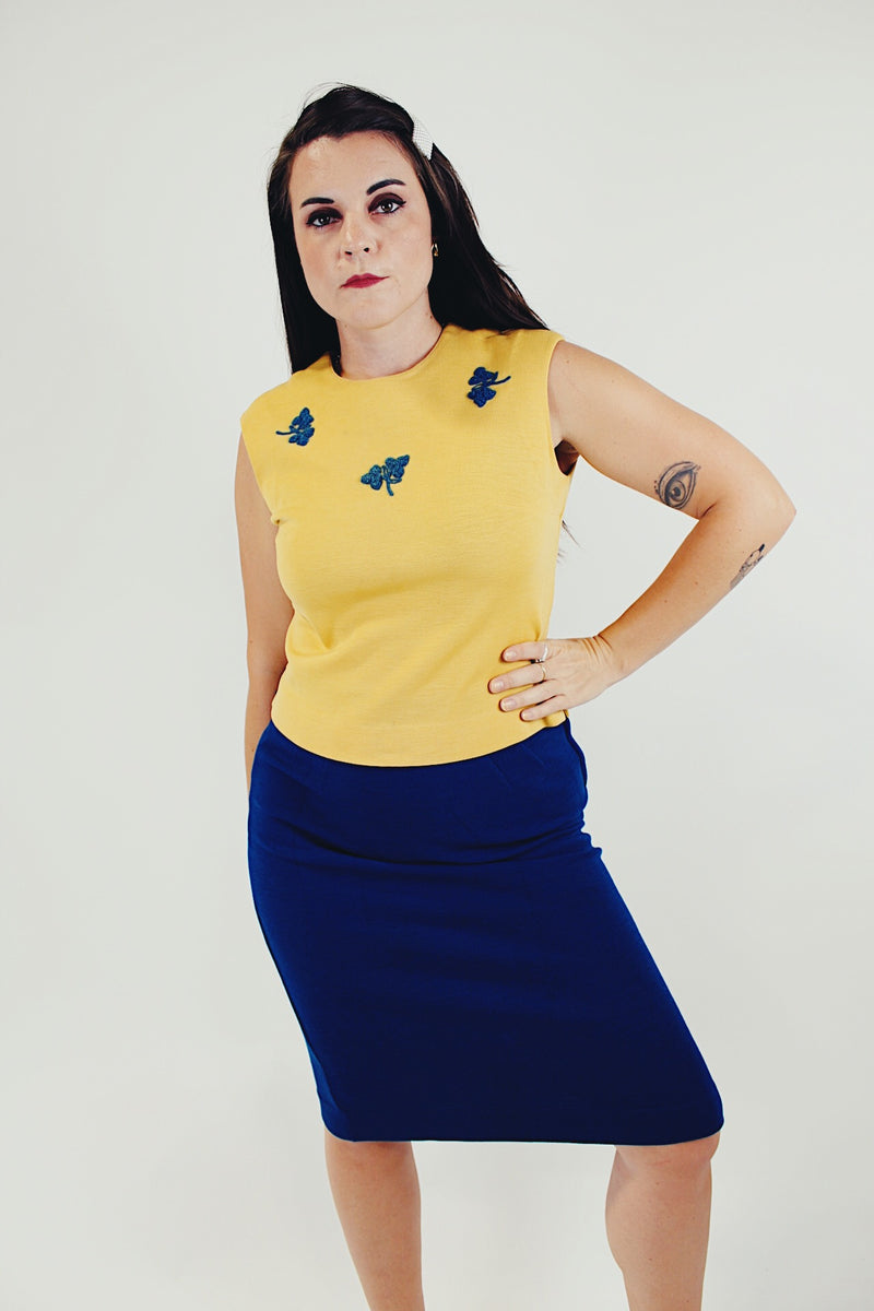 vintage three piece knit set with blue cropped jacket, midi skirt, and sleeveless embroidered top front without jacket