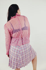 long sleeve vintage sheer pink blouse with ruffled collar and cuffs back