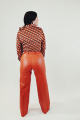 vintage pleather two piece set in burnt orange includes button up collared jacket and high waist pants back just pants