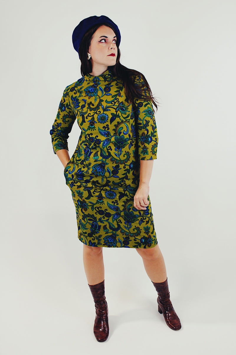 Green and blue paisley printed midi dress with mock neck and 3/4 length sleeves front