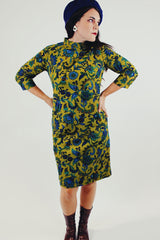 Green and blue paisley printed midi dress with mock neck and 3/4 length sleeves front