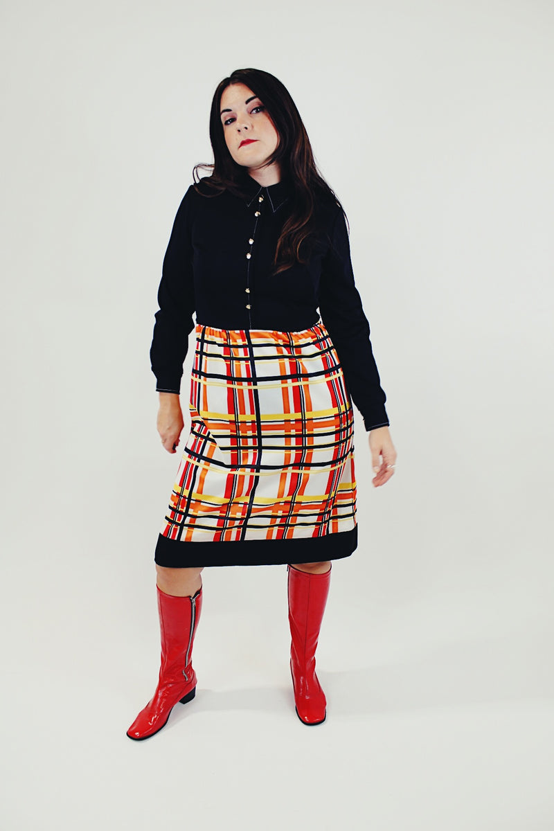 long sleeve midi length vintage dress twofer black with orange yellow and red plaid print bottom button up with collar front