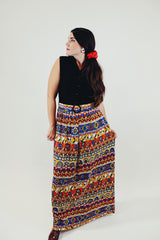 vintage slinky polyester sleeves dress with button up top in black and printed bottom skirt with matching belt front