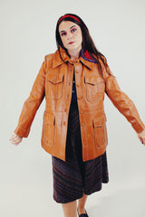 Vintage camel colored pleather jacket with four front pocket front open