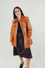 Vintage camel colored pleather jacket with four front pocket front open